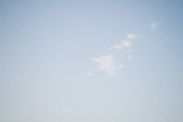 istock Beautiful blue sky with few clouds on bright  sunny day 1180763402