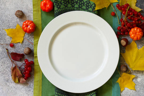 istock Autumn rustic table. Thanksgiving or autumn harvest table setting on stone or slate table. Top view of a flat lay. Free space for your text. 1180763479