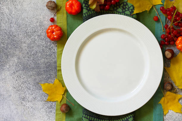 istock Autumn rustic table. Thanksgiving or autumn harvest table setting on stone or slate table. Top view of a flat lay. Free space for your text. 1180763481