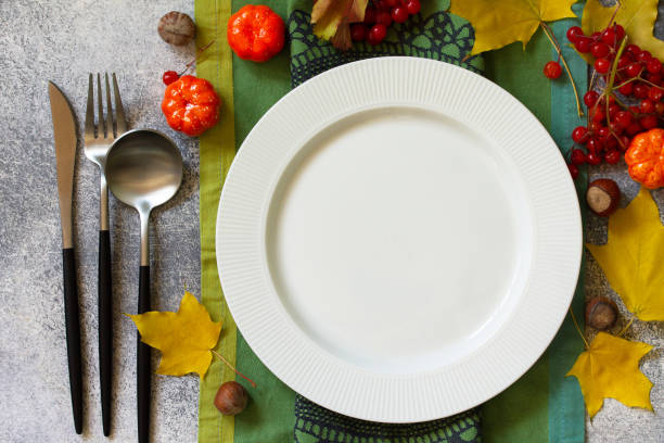 istock Autumn rustic table. Thanksgiving or autumn harvest table setting on stone or slate table. Top view of a flat lay. Free space for your text. 1180763488