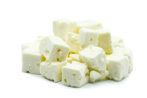 istock Feta cheese cubes isolated on white background 1180765756