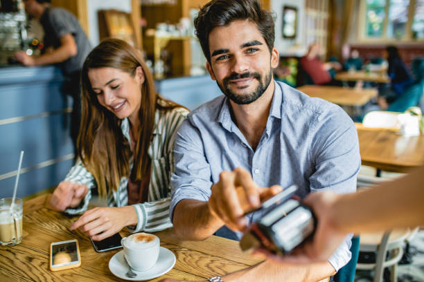 istock Contactless Payment in a coffee shop 1180768755