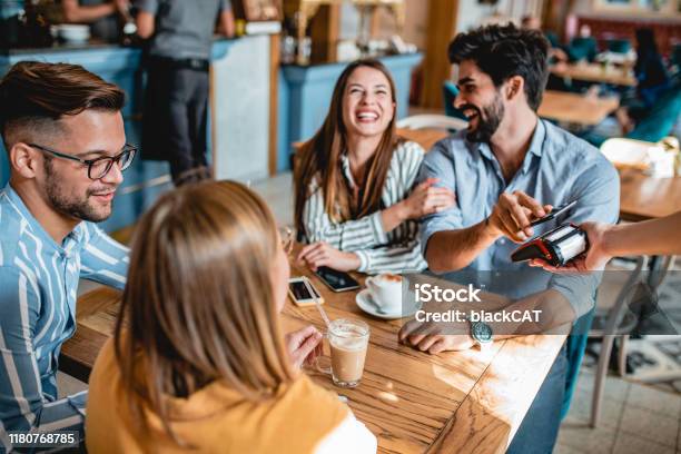 Contactless Payment In A Coffee Shop Stock Photo - Download Image Now - Paying, Restaurant, Friendship