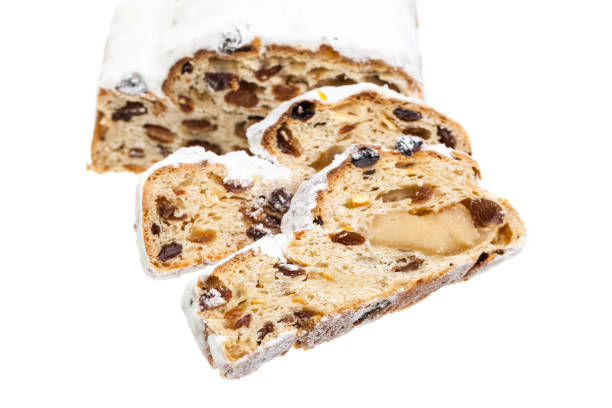 istock Christmas cake slices isolated on white background 1180768843
