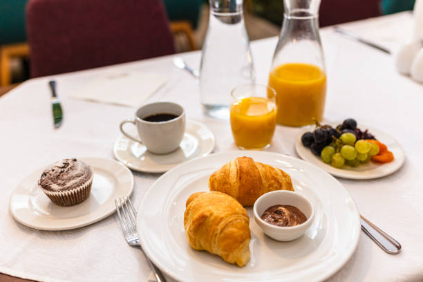 istock Breakfast with croissants and cup of coffee 1180772279