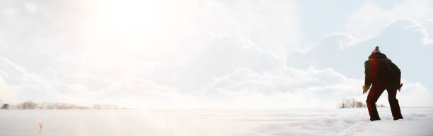 istock A man on a walk. Winter landscape. Tourist in winter journey. 1180772453