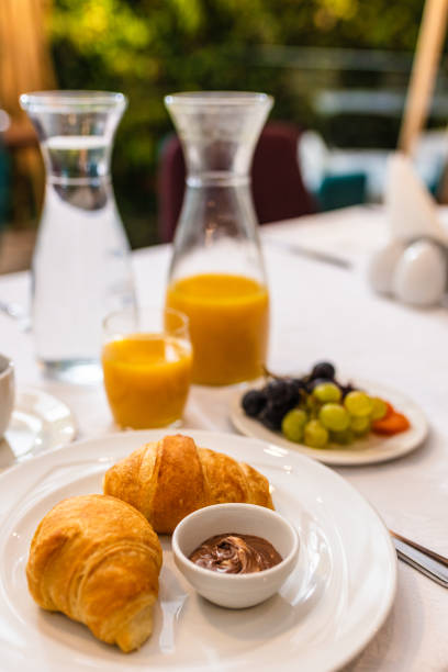 istock Breakfast with croissants and cup of coffee 1180772483