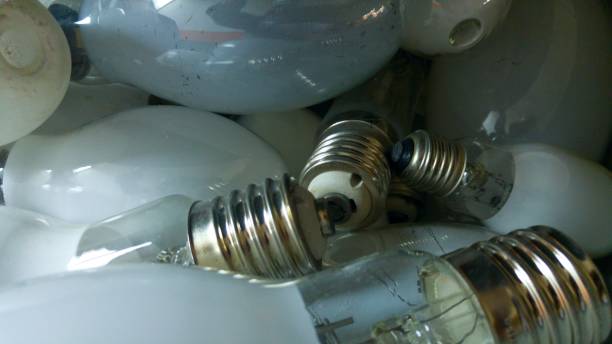 istock Burnt out bulb for recycling 1180776344