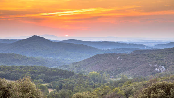 istock Orange Sunrise over Cevennes national park 1180776358