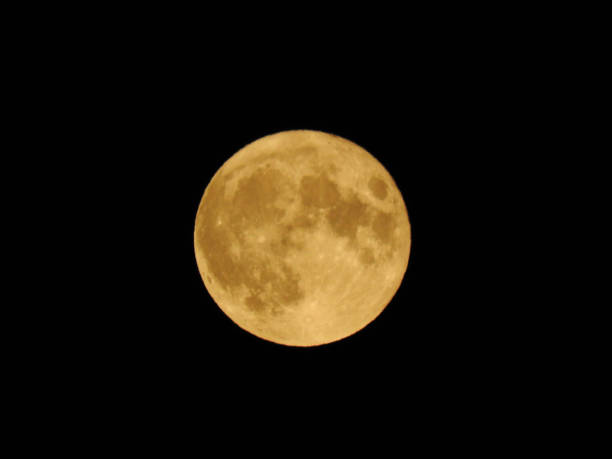 istock Nice full moon with soft yellow color in visible craters 1180784095