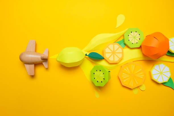 istock letter summer cut from paper with tropical fruit paper 1180784189