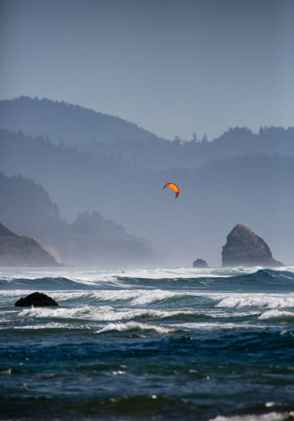 Kiteboarding on the pacific coast on a windy day in Oregon