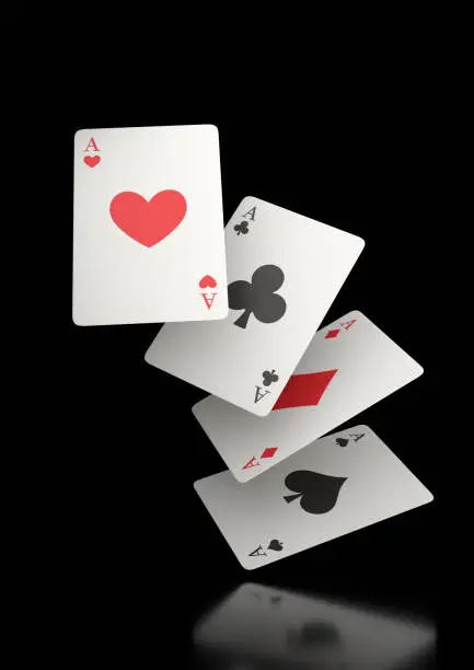 Photo of Falling playing cards on a white background