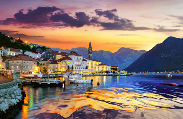 Perast in Bay of Kotor Historic city of Perast in the Bay of Kotor in summer at sunset montenegro stock pictures, royalty-free photos & images
