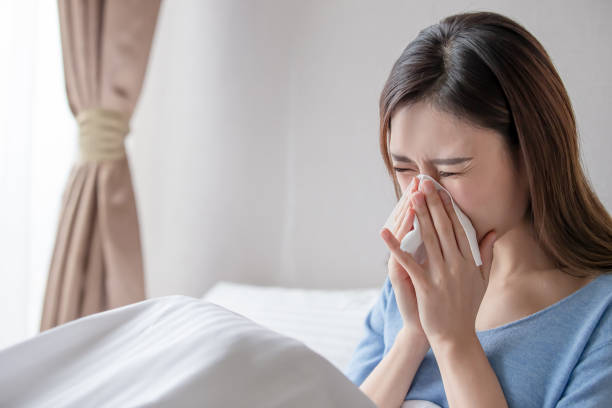 istock woman has running nose 1180790776