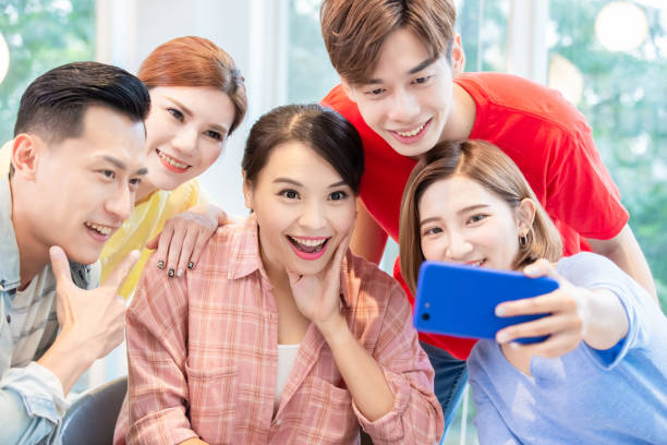 istock man and woman take selfie 1180790906