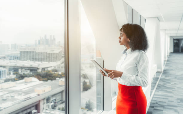 istock Businesswoman with a digital tablet 1180792502