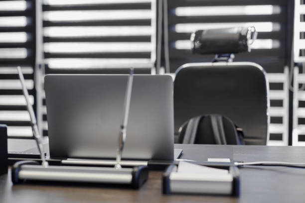 Laptop in office workplace. Business work place for chief, boss or other employees. Notebook on work table.
