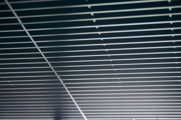 istock Office grille ceiling. Modern black metal grille ceiling, suspended covering. Abstract design texture. 1180793439