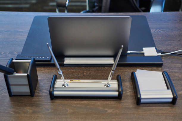 istock Laptop in office workplace. Business work place for chief, boss or other employees. Notebook on work table. 1180793454