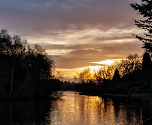 istock Winter sunset over Lake in Nottinghamshire, England 1180793481