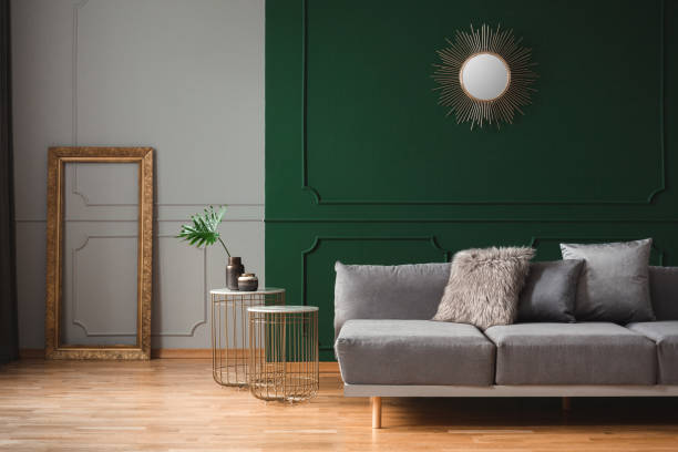 istock Pillows on luxury couch in simple living room interior 1180795493