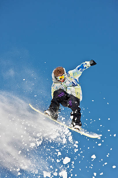 istock Snowboarder Hanging In Mid-Air Making Jump 118079666