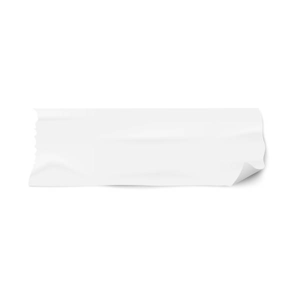 istock Piece of white masking duct tape with rounded curled corner 1180797066