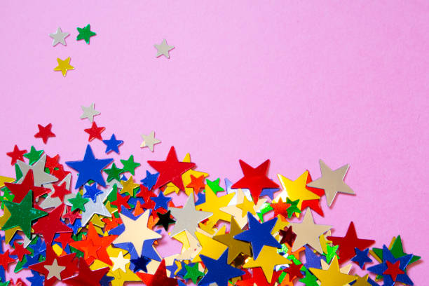 istock Glitter Tinsel Stars Close Up For Background 1180797340