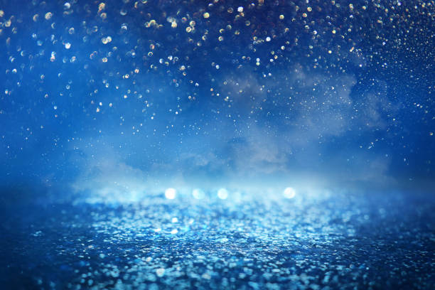 istock abstract glitter silver, gold , blue lights background. de-focused 1180797495