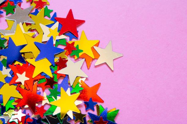 istock Glitter Tinsel Stars Close Up For Background 1180797529