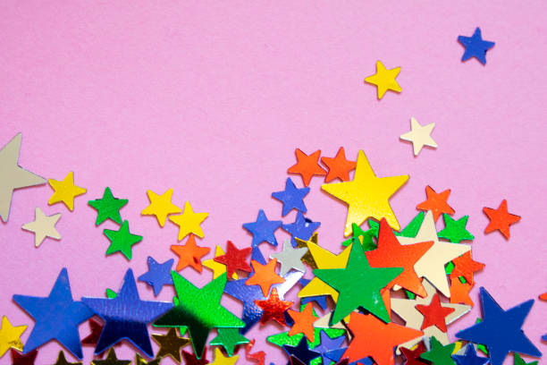 istock Glitter Tinsel Stars Close Up For Background 1180797530