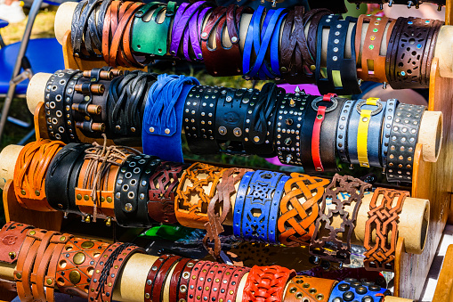 Different leather wristbands for sale on street fair