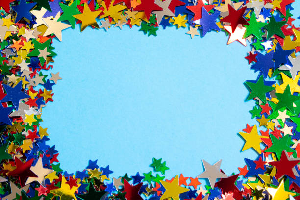 istock Glitter Tinsel Stars Border Frame Close Up For Background 1180798447