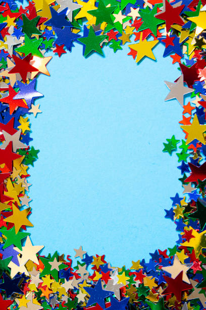 istock Glitter Tinsel Stars Border Frame Close Up For Background 1180798456