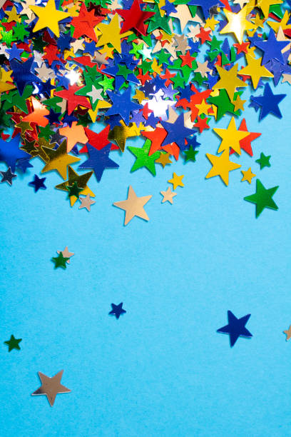 istock Glitter Tinsel Stars Close Up For Background 1180798490