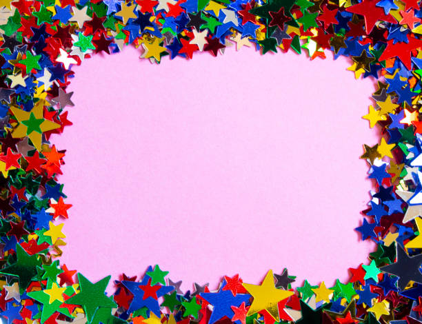 istock Glitter Tinsel Stars Border Frame Close Up For Background 1180798498