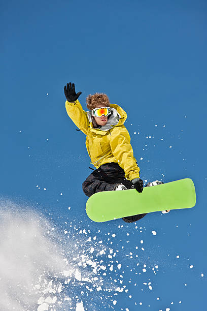 istock Snowboarder Flying Through Air In Extreme Jump 118079883