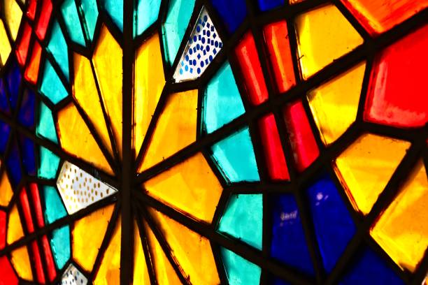 istock A beautiful stained glass window inside a church. 1180799835