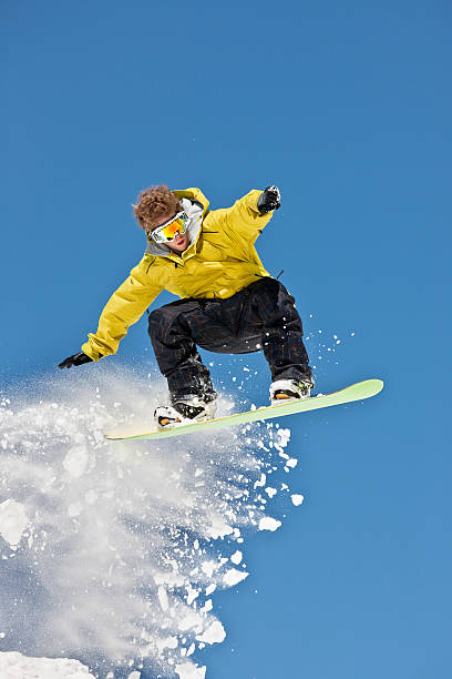 istock Expert Snowboarder In Jumping Position 118080012