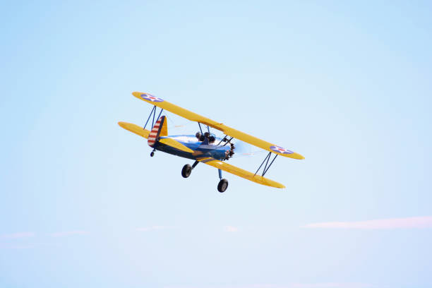 cerny, france. stearman pt 17. - airplane stunt yellow flying photos et images de collection