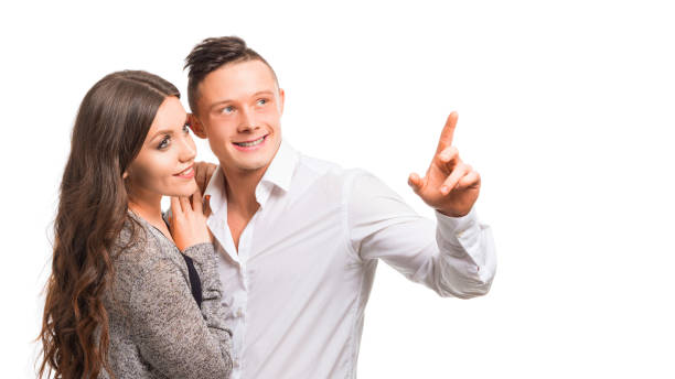 istock Couple. Woman holding man and looking by side. 1180801469