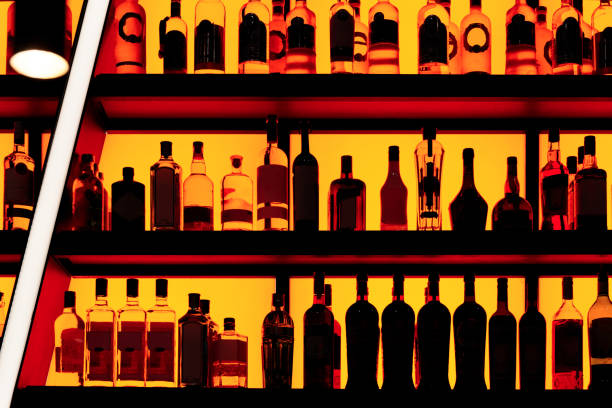 istock Bottles sitting on shelf in a bar 1180803678