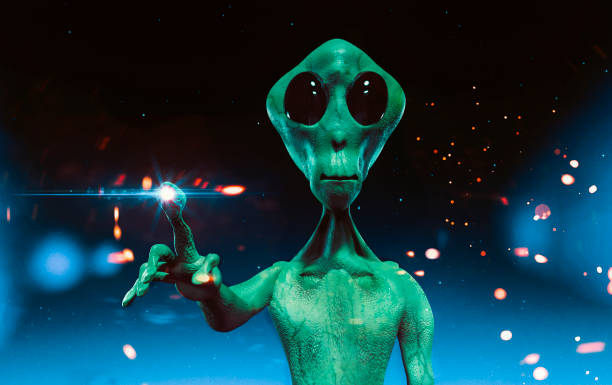 istock Alien from outer space tries to communicate with touch of finger 1180806874