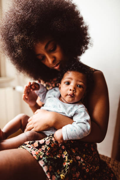istock little daughter with mom 1180810631