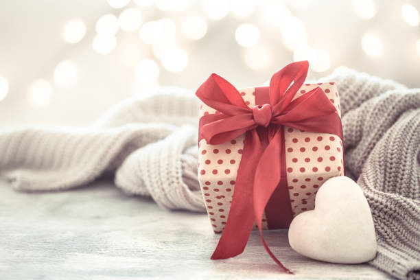 istock Background holiday, gift in a beautiful box with a heart . 1180810815
