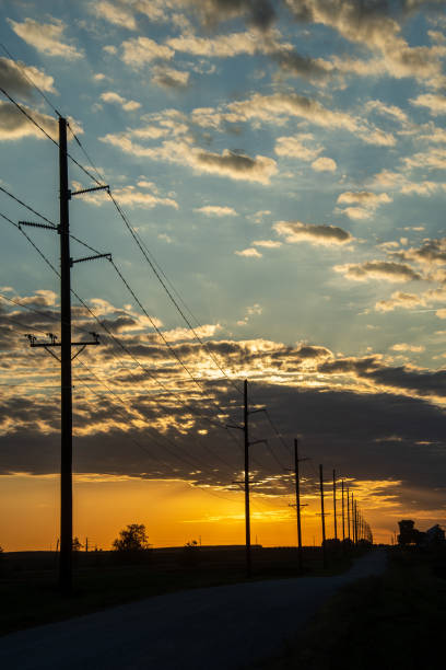 istock Power lines in a rural sunset. 1180817744