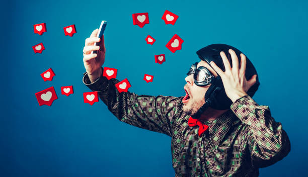 Success with social media on mobile phone makes man happy