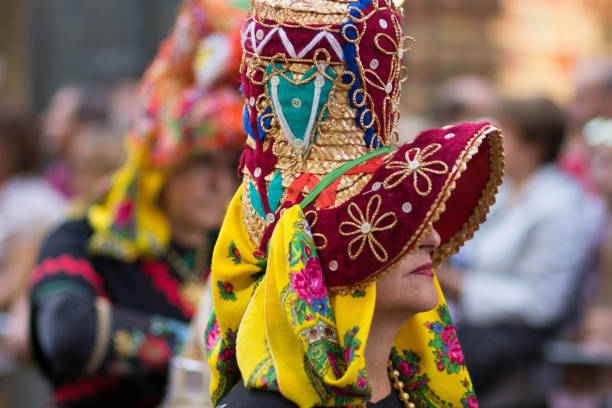Fiestas del Pilar festival in Zaragoza, Spain. On the morning of October 13, the Offering of Fruits takes place, \nwith the participation of delegations from all over Spain, dressed in their regional costumes.