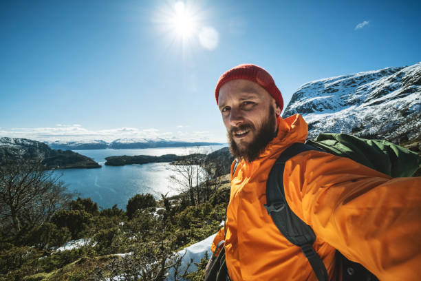 istock Man outdoor adventures: selfie in Norway 1180824189
